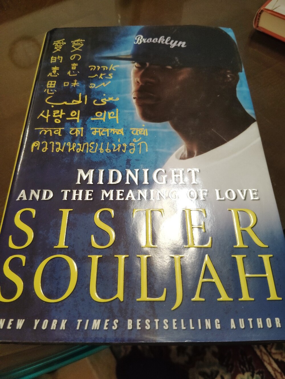 Midnight and the Meaning of Love by Sister Souljah - Blue & Yellow Cover